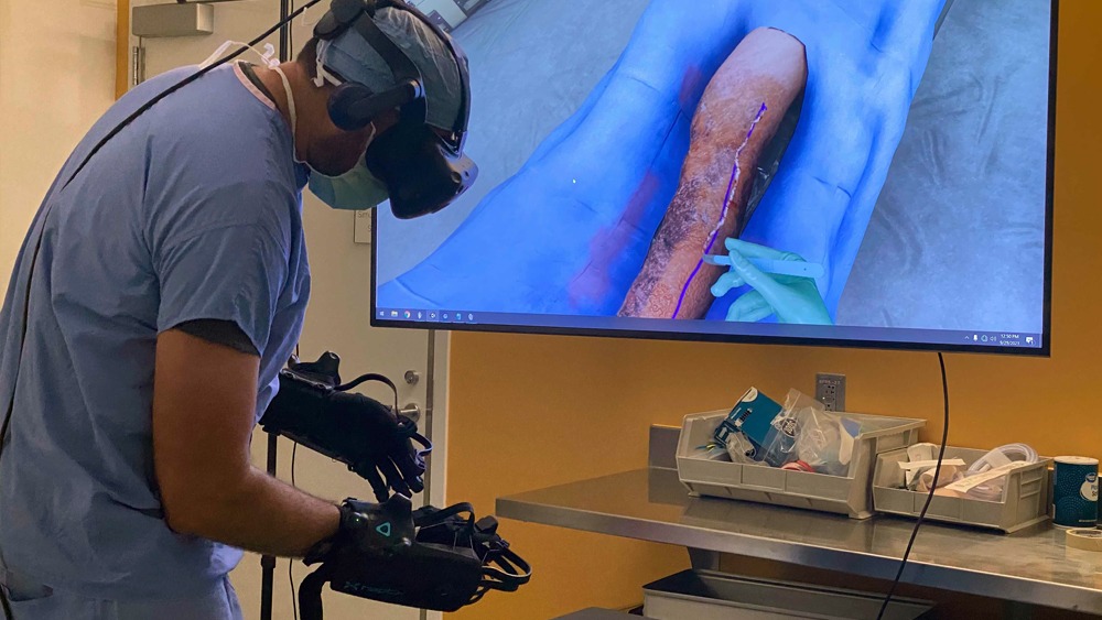 Surgeon performs a simulated escharotomy using advanced haptics simulation in VR.